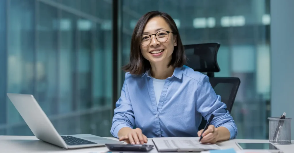 Financial controller analyzing reports and using data to improve business cash flow and profitability