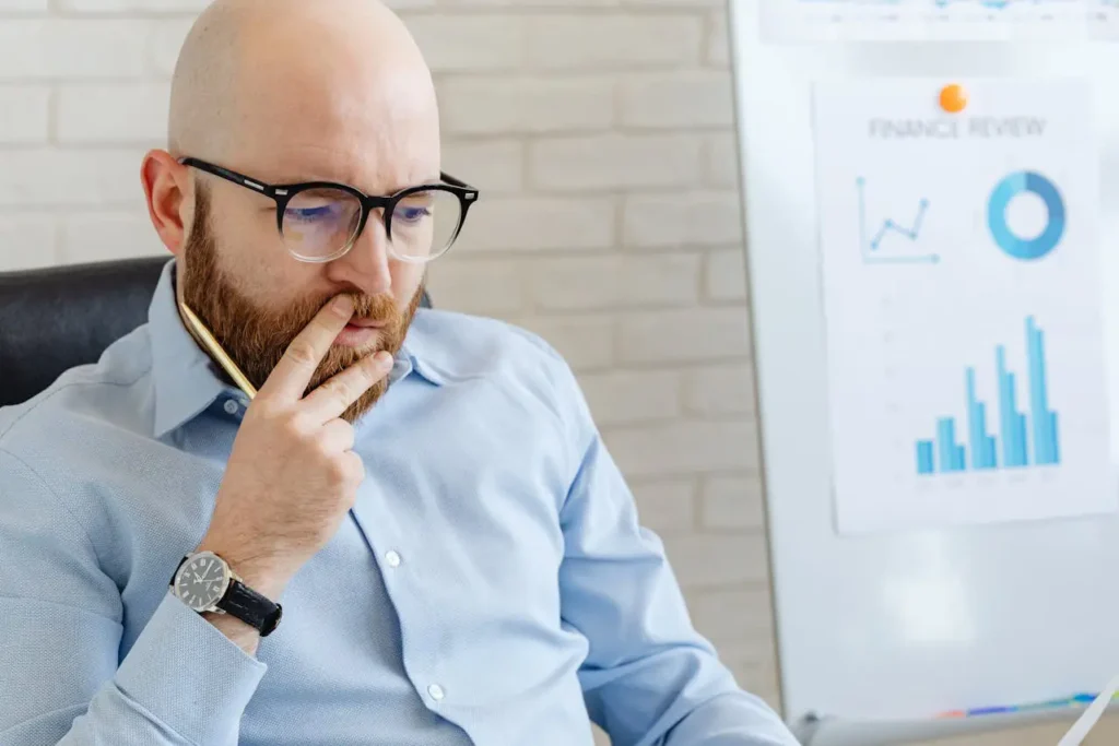 Fractional controller analyzing business financial performance and reporting data